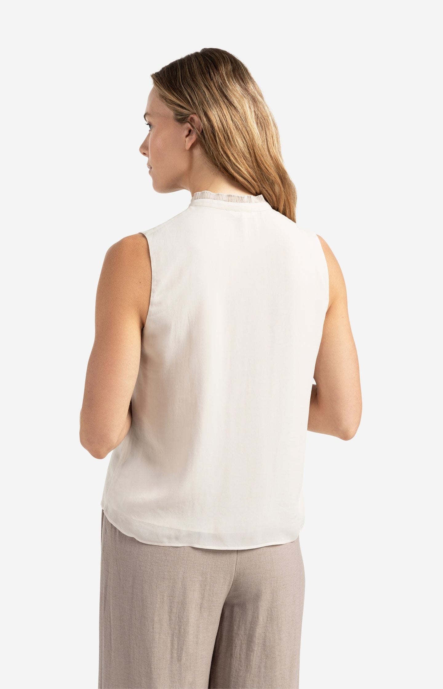 Elly | Sleeveless top with ruffled collar